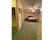 Bedroom featuring a bed, nightstand, and framed pictures on the wall at 1165 Vineyard Ct, Stone Mountain, GA 30083