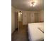 Bedroom with multiple doors and a queen sized bed at 1165 Vineyard Ct, Stone Mountain, GA 30083