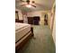 Bedroom with bed, dresser, and television, providing a comfortable and functional space at 1165 Vineyard Ct, Stone Mountain, GA 30083