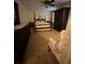 Bedroom with bed and carpet floors, illuminated by a ceiling fan at 1165 Vineyard Ct, Stone Mountain, GA 30083