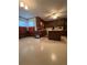 Well-lit kitchen area with wood cabinets and a center island, blending functionality and style for a practical cooking space at 1165 Vineyard Ct, Stone Mountain, GA 30083