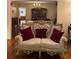 Charming living room area featuring a decorative sofa and hardwood flooring, blending elegance and comfort seamlessly at 1165 Vineyard Ct, Stone Mountain, GA 30083