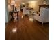Elegant living room with polished hardwood floors and exquisite furniture, offering a luxurious living space at 1165 Vineyard Ct, Stone Mountain, GA 30083