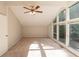 Bedroom featuring vaulted ceiling and an oversized window with beautiful green views at 1282 Shiloh Trail E, Kennesaw, GA 30144