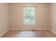 Bedroom features a neutral paint scheme and large window at 1282 Shiloh Trail E, Kennesaw, GA 30144