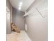 Unfinished walk-in closet with a wire shelving system and unfinished stairs at 1282 Shiloh Trail E, Kennesaw, GA 30144