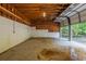 Garage interior with overhead lighting, concrete floor, and an open garage door at 1282 Shiloh Trail E, Kennesaw, GA 30144