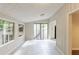 Bright living room with tile floors and sliding glass doors that lead to outdoor space at 1282 Shiloh Trail E, Kennesaw, GA 30144