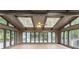 Sun room with wood flooring, skylights, windows and a ceiling fan at 1282 Shiloh Trail E, Kennesaw, GA 30144