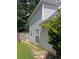 Exterior of home displaying the siding, backyard, and partial fence at 2234 Oakland Springs Dr, Snellville, GA 30039