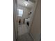 Cozy laundry room featuring a modern washer and dryer, plus shelving for storage at 2234 Oakland Springs Dr, Snellville, GA 30039