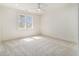 Spacious bedroom featuring neutral carpet, window, and natural light at 529 Claude Scott Rd, Canton, GA 30115