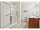 Clean bathroom featuring a walk-in shower, grab bars, and thoughtful design elements at , Buford, GA 30518