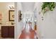Hallway with wood floors and access to a bathroom and seating area at , Buford, GA 30518