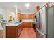 Spacious kitchen featuring wood cabinets, stainless steel appliances, and a functional layout at , Buford, GA 30518