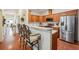 Well-appointed kitchen featuring modern appliances, granite countertops, and a convenient breakfast bar area at , Buford, GA 30518