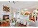 Elegant living room showcasing a fireplace, hardwood floors, and open access to the kitchen at , Buford, GA 30518