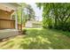 Enjoy backyard featuring a detached garage, providing extra space and convenience at 1104 Victory Sw Dr, Atlanta, GA 30310