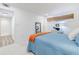 Serene bedroom features natural light, a desk, and neutral décor at 1445 Monroe Ne Dr # C32, Atlanta, GA 30324