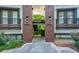 Two-story apartment building featuring wood trim and balconies with iron railings at 1445 Monroe Ne Dr # C32, Atlanta, GA 30324