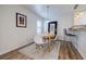 Charming dining area featuring modern pendant lighting and a view of the kitchen at 1445 Monroe Ne Dr # C32, Atlanta, GA 30324
