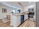 Beautiful kitchen offers stainless steel appliances, granite countertops, and an open-concept dining area at 1445 Monroe Ne Dr # C32, Atlanta, GA 30324