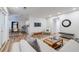 Open-concept living room and dining area with wood floors and lots of natural light at 1445 Monroe Ne Dr # C32, Atlanta, GA 30324