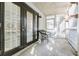 Relaxing outdoor patio with black framed doors and plenty of natural light at 1445 Monroe Ne Dr # C32, Atlanta, GA 30324