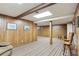 Spacious basement with wood-paneled walls, and ample room for recreation and storage, a versatile area at 300 Stone Mill Trl, Atlanta, GA 30328