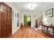 Bright entryway with hardwood floors, stairs and a view into the dining room at 300 Stone Mill Trl, Atlanta, GA 30328
