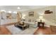 Inviting living room with hardwood floors, built-in shelves, and comfortable seating at 300 Stone Mill Trl, Atlanta, GA 30328