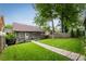 Exterior showing a backyard with an expansive green lawn, and a brick walkway at 1232 Lucile Sw Ave, Atlanta, GA 30310