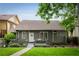 Home exterior featuring a deck, a lush green lawn, and landscaped garden beds at 1232 Lucile Sw Ave, Atlanta, GA 30310