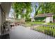 Cozy backyard with a patio deck that includes two chairs and a small table at 1232 Lucile Sw Ave, Atlanta, GA 30310