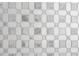 Close-up of a detailed marble bathroom floor with an intricate design at 1232 Lucile Sw Ave, Atlanta, GA 30310