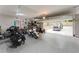 Interior view of the garage featuring epoxy floors and storage racks at 1232 Lucile Sw Ave, Atlanta, GA 30310