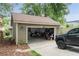 Garage exterior view with a truck in the driveway at 1232 Lucile Sw Ave, Atlanta, GA 30310