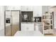 Modern kitchen with stainless steel appliances, subway tile backsplash, and marble countertops at 1232 Lucile Sw Ave, Atlanta, GA 30310