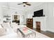 Inviting living room with a fireplace, coffered ceiling, and open layout, perfect for entertaining at 1232 Lucile Sw Ave, Atlanta, GA 30310