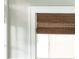 Close-up of a window with natural woven shades, highlighting the architectural details at 1232 Lucile Sw Ave, Atlanta, GA 30310
