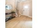 Inviting foyer features hardwood floors, stylish console table, and staircase at 2561 Adair Ridge Ct, Decatur, GA 30034