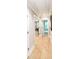 Hallway with hardwood floors and doors leading to other rooms at 2561 Adair Ridge Ct, Decatur, GA 30034