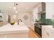 Stylish kitchen boasts quartz countertops, stainless steel appliances, and modern lighting fixtures at 2561 Adair Ridge Ct, Decatur, GA 30034