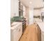 Bright kitchen with quartz countertops, stainless steel appliances, and green tile backsplash at 2561 Adair Ridge Ct, Decatur, GA 30034