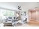 Comfortable living room showcasing neutral color palette, hardwood floors, and natural light at 2561 Adair Ridge Ct, Decatur, GA 30034