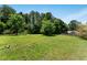 Spacious backyard with lush greenery, offering a serene and private outdoor space at 3620 Darwin Pl, Duluth, GA 30096