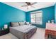 Charming bedroom with a large window, soothing colors, and plenty of natural light at 3620 Darwin Pl, Duluth, GA 30096