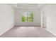 Bedroom with a window that offers view of the outdoors at 5843 Taka Ln, Lithonia, GA 30038