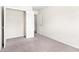 Bedroom with neutral carpet and a closet with an open door at 5843 Taka Ln, Lithonia, GA 30038