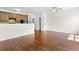 Hardwood floors and an open floor plan to a kitchen enhance this living space at 5843 Taka Ln, Lithonia, GA 30038